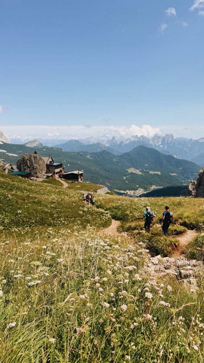 Rifugio Coldai - hikers arriving on the trail below the hut